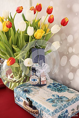 Traditional Easter candles decorated with ribbons and evil eye Stock Photo