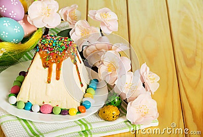 Traditional Easter cheesecake dessert, Easter eggs, flowers and Stock Photo