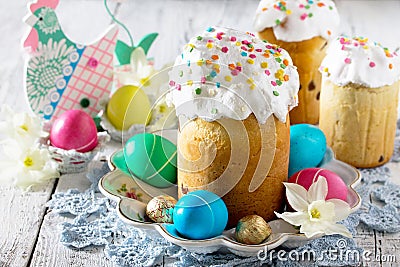 The traditional Easter treats: cakes and colorful easter eggs Stock Photo