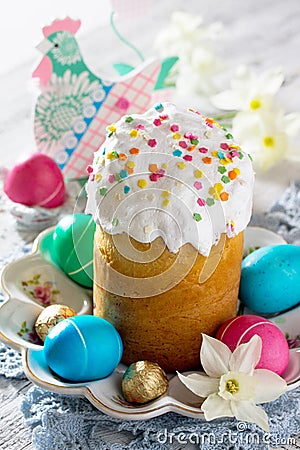 The traditional Easter treats: cakes and colorful easter eggs Stock Photo