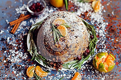 Traditional English Christmas plum pudding, sugar icing Stock Photo