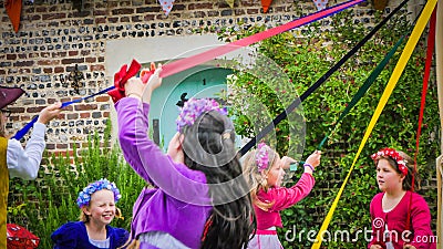 Traditional English dance during a medieval fair in Milton Abbas, UK Editorial Stock Photo