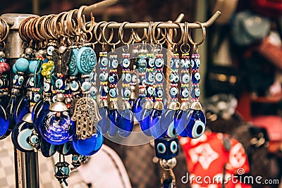 Traditional evil eye bead - protection amulet at souvenir store. Popular touristic souvenir and talisman in different Stock Photo