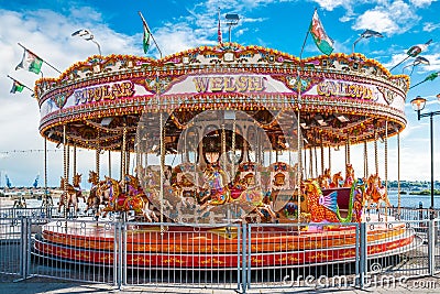 Traditional fairground vintage carousel in Cardiff Editorial Stock Photo