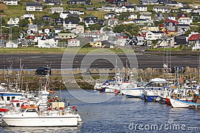 Traditional faroese village with harbor beach and houses. Sorvagur Stock Photo