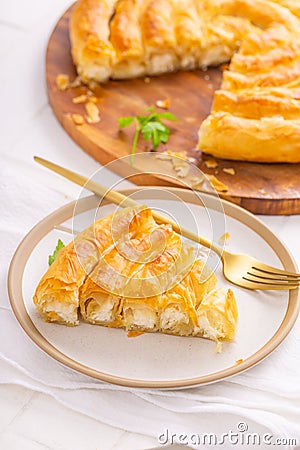 Traditional feta cheese phyllo pastry pie, borek or burek Stock Photo