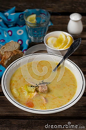 Traditional Finnish salmon cream soup Lohikeitto with potatoes and leeks Stock Photo