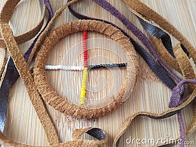 Traditional first nations medicine wheel on a wood background Stock Photo