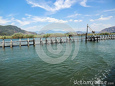 Traditional fish barriers on the river to regulate fish spawning Stock Photo
