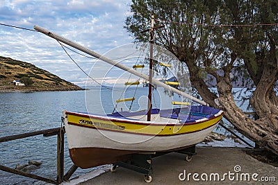 Traditional fishing boat at the village of Mochlos, Crete, Greece Editorial Stock Photo