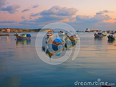 Traditional fishing boats at harbor of Marsaxlokk Editorial Stock Photo