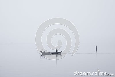 Traditional fishing boats during toil Stock Photo