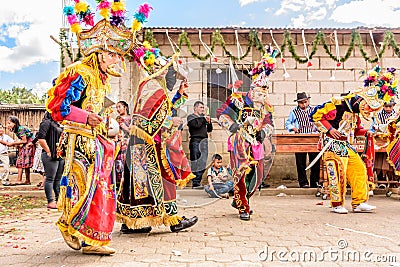 Traditional folk dancers in street, Guatemala Editorial Stock Photo