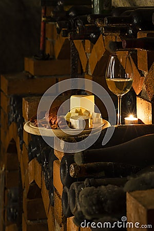 Traditional food in a wine cellar with archival wine, Znojmo region, Southern Moravia, Czech Republic Editorial Stock Photo