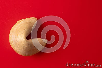 Traditional fortune cookie on red background Stock Photo
