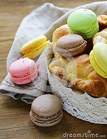 Traditional French pastries croissants and macaroons Stock Photo