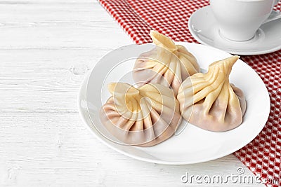 Traditional Georgian dish Khinkali stuffed dough close up Stock Photo