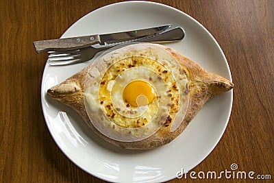 Traditional Georgian Khachapuri cheese pie with egg Stock Photo