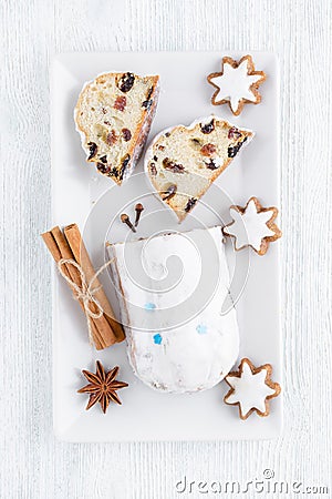 Traditional german christmas cake stollen with cookies Stock Photo