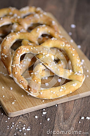 Traditional German Salted Pretzels on Serving Board Stock Photo