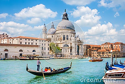 Traditional Gondola on Canal Grande with Basilica di Santa Maria della Salute in Venice Editorial Stock Photo