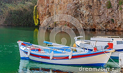 Traditional Greek boat at Aghios Nikolaos port Editorial Stock Photo