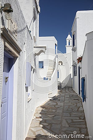 Typical greek island street in Tinos, Greece Stock Photo