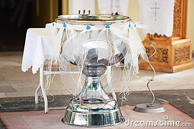 Traditional greek kolimbithra at a greek Orthodox christening Stock Photo