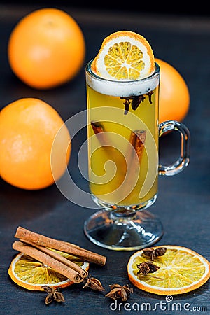 traditional grog drink with cinnamon sticks and orange Stock Photo