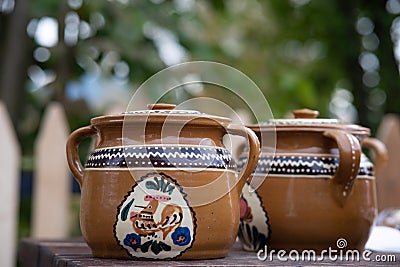 Traditional hand made ceramic potter with design Stock Photo