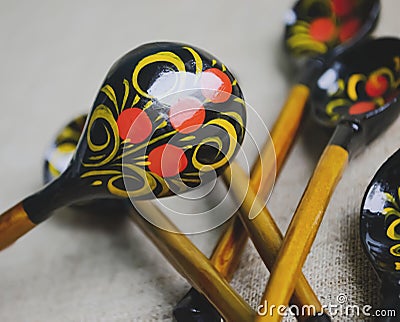 Traditional hohloma spoons. Ukrainian spoons made of wood, colorful Khokhloma painting.Wooden spoons - Khokhloma Stock Photo