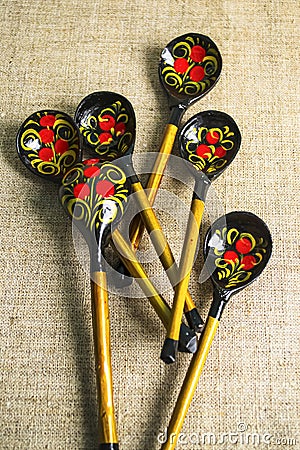 Traditional hohloma spoons. Ukrainian spoons made of wood, colorful Khokhloma painting.Wooden spoons - Khokhloma Stock Photo