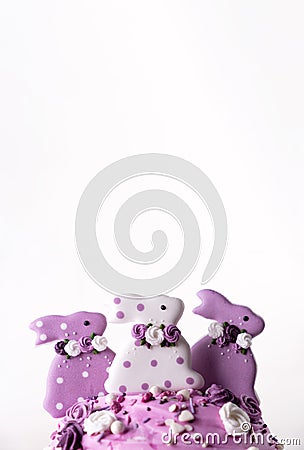 Traditional holiday Easter cakes decorated with lilac bunnys. Greeting card Stock Photo