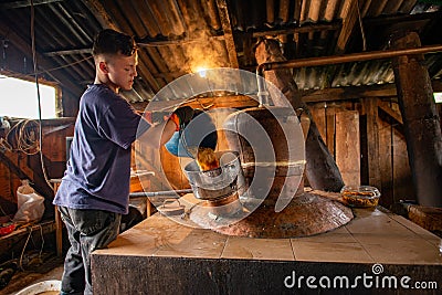 Traditional home made brandy distillery in country side of Romania, Horinca making in Maramures County Editorial Stock Photo