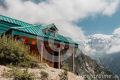 A traditional homestay nestled in the Kinner Kailash Mountain range amid mountains and valleys Stock Photo