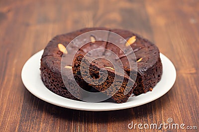 Traditional honey cake of Madeira, Portugal on white plate Stock Photo