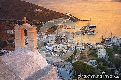 Traditional houses, wind mills and churches in Ios island, Cyclades, Greece. Stock Photo