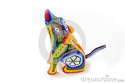 Traditional huichol bead wolf coyote ornament figures mexican culture Stock Photo