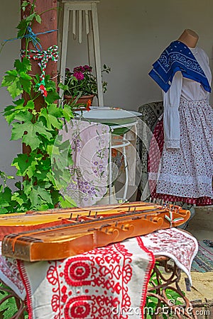 Traditional Hungarian objects exhibited on one home porch Stock Photo