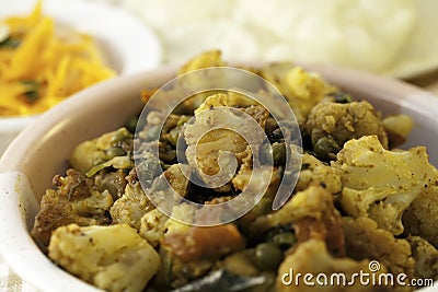 A Traditional Indian Cauliflower and Pea Curry Stock Photo