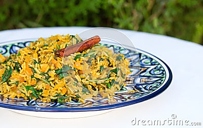 Traditional Indian dish called khichdi with cinnamon stick Stock Photo