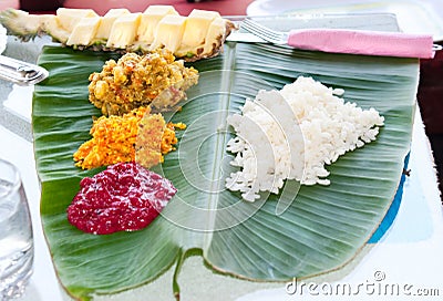 Traditional Indian meal serve on banana leaves Stock Photo