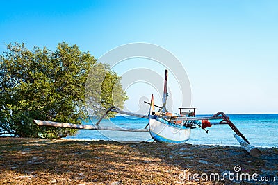 Traditional indonesian boat on the beach Stock Photo