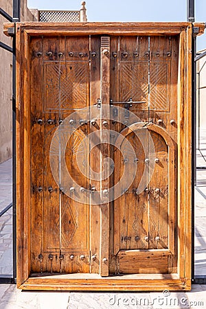 Traditional islamic wooden carved doors of Al Shindagha Historic Neighborhood, Al Fahidi, Dubai, UAE Stock Photo