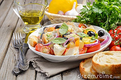 Traditional Italian Panzanella salad with fresh tomatoes and crispy bread Stock Photo