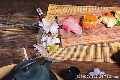 Traditional Japanese cuisine. Process of eating sushi rolls or s Stock Photo