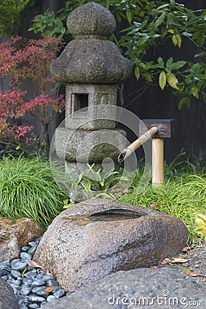 Traditional japanese fountain tsukubai Stock Photo