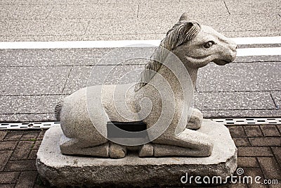 Traditional japanese style rock sculpture and carving as animal stone horse one of 12 Zodiac at Narita old town in Chiba, Japan Editorial Stock Photo