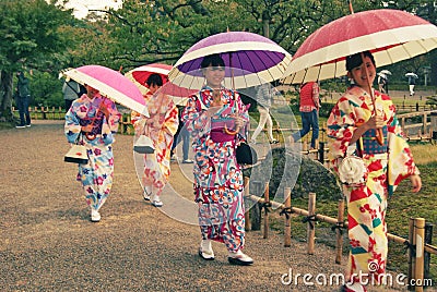 Traditional kimonos in Kenroku-en garden in Kanazawa Editorial Stock Photo