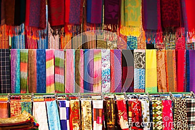Traditional Laotian dresses and scarf in clothing store Stock Photo